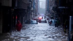 Emergency alerts beamed to mobile phones and red level weather warnings activated for torrential downpours in Valencia region of Spain