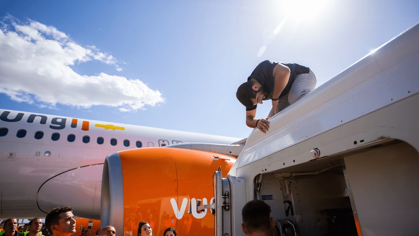 Valencia airport incident: Man climbs onto roof of Vueling plane and delays flight