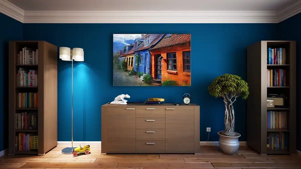 Televisor genérico en salón con mando y catálogo de ofertas sobre mueble